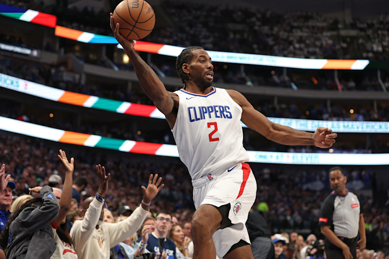 DALLAS, TX - April 26: Kawhi Leonard #2 of the LA Clippers passes the ball during the game against the Dallas Mavericks during Round 1 Game 3 of the 2024 NBA Playoffs on April 26, 2024 at the American Airlines Center in Dallas, Texas. NOTE TO USER: User expressly acknowledges and agrees that, by downloading and or using this photograph, User is consenting to the terms and conditions of the Getty Images License Agreement. Mandatory Copyright Notice: Copyright 2024 NBAE (Photo by Tim Heitman/NBAE via Getty Images)