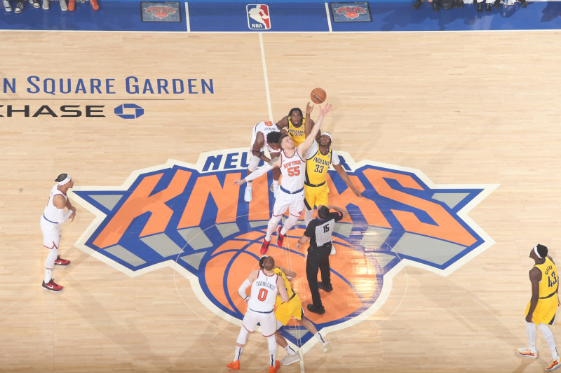 NEW YORK, NY - MAY 6: Isaiah Hartenstein #55 of the New York Knicks and Myles Turner #33 of the Indiana Pacers go up for the opening tip off during the game during Round 2 Game 1 of the 2024 NBA Playoffs on May 6, 2024 at Madison Square Garden in New York City, New York.  NOTE TO USER: User expressly acknowledges and agrees that, by downloading and or using this photograph, User is consenting to the terms and conditions of the Getty Images License Agreement. Mandatory Copyright Notice: Copyright 2024 NBAE  (Photo by Nathaniel S. Butler/NBAE via Getty Images)