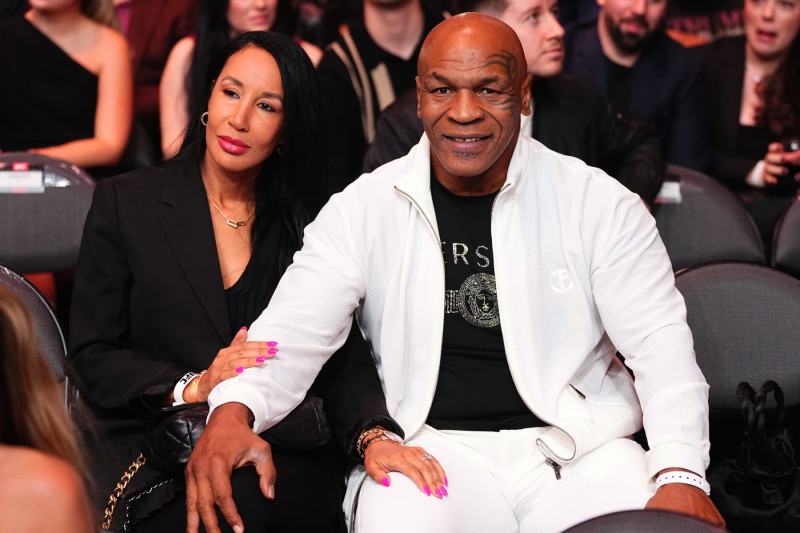 LAS VEGAS, NEVADA - APRIL 13: Mike Tyson and wife attend the UFC 300 event at T-Mobile Arena on April 13, 2024 in Las Vegas, Nevada. (Photo by Jeff Bottari/Zuffa LLC via Getty Images)