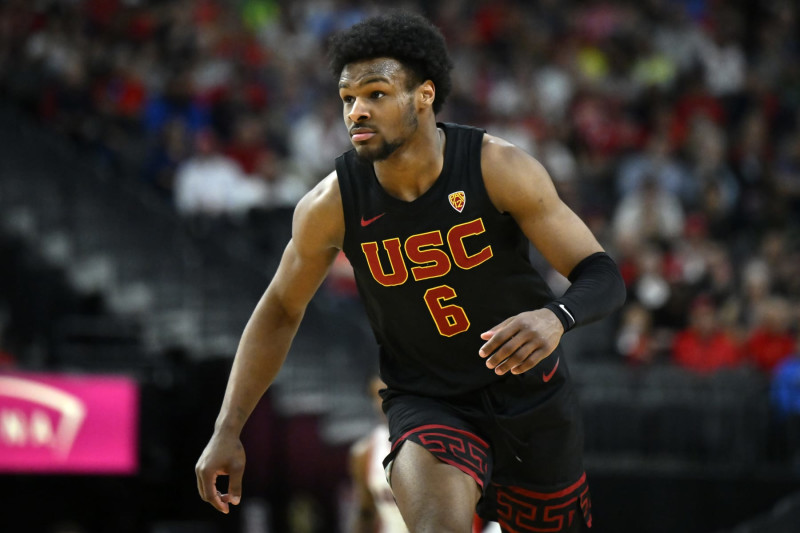 LAS VEGAS, NEVADA - MARCH 14: Bronny James #6 of the USC Trojans looks on in the second half of a quarterfinal game against the Arizona Wildcats during the Pac-12 Conference basketball tournament at T-Mobile Arena on March 14, 2024 in Las Vegas, Nevada. The Wildcats defeated the Trojans 70-49. (Photo by David Becker/Getty Images)