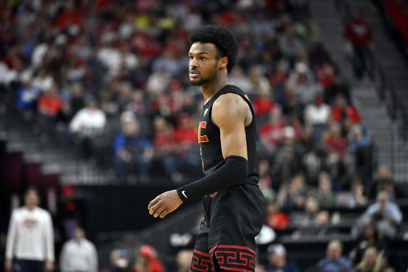 LAS VEGAS, NEVADA - MARCH 14: Bronny James #6 of the USC Trojans looks on in the second half of a quarterfinal game against the Arizona Wildcats during the Pac-12 Conference basketball tournament at T-Mobile Arena on March 14, 2024 in Las Vegas, Nevada. The Wildcats defeated the Trojans 70-49. (Photo by David Becker/Getty Images)