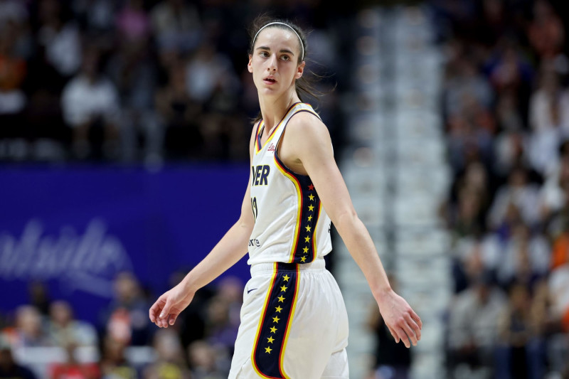 UNCASVILLE, CONNECTICUT - MAY 14: Caitlin Clark #22 of the Indiana Fever looks on during the first quarter against the Connecticut Sun in the game at Mohegan Sun Arena on May 14, 2024 in Uncasville, Connecticut. NOTE TO USER: User expressly acknowledges and agrees that, by downloading and or using this photograph, User is consenting to the terms and conditions of the Getty Images License Agreement. (Photo by Elsa/Getty Images)