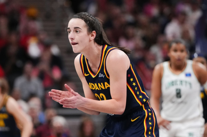 INDIANAPOLIS, INDIANA - MAY 16: Caitlin Clark #22 of the Indiana Fever reacts in the third quarter against the New York Liberty at Gainbridge Fieldhouse on May 16, 2024 in Indianapolis, Indiana. NOTE TO USER: User expressly acknowledges and agrees that, by downloading and or using this photograph, User is consenting to the terms and conditions of the Getty Images License Agreement (Photo by Dylan Buell/Getty Images)