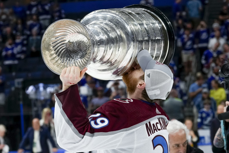 TAMPA, FL - JUNE 26: Colorado Avalanche center Nathan MacKinnon (29) hoisting the Stanley Cup during the NHL Hockey Stanley Cup Finals Game six between Tampa Bay Lightning and the Colorado Avalanche on June 26th, 2022 at Amalie Arena in Tampa Florida (Photo by Andrew Bershaw /Icon_Sportswire)