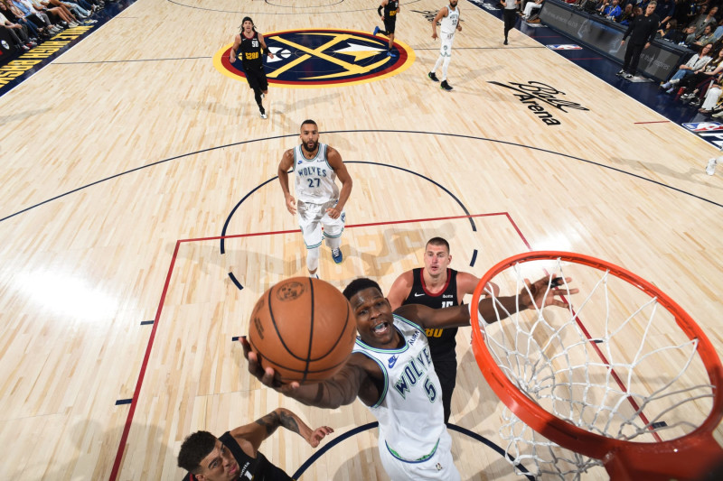 DENVER, CO - MAY 19:  Anthony Edwards #5 of the Minnesota Timberwolves goes to the basket during the game against the Denver Nuggets during Round 2 Game 7 of the 2024 NBA Playoffs  on May 19, 2024 at the Ball Arena in Denver, Colorado. NOTE TO USER: User expressly acknowledges and agrees that, by downloading and/or using this Photograph, user is consenting to the terms and conditions of the Getty Images License Agreement. Mandatory Copyright Notice: Copyright 2024 NBAE (Photo by Garrett Ellwood/NBAE via Getty Images)