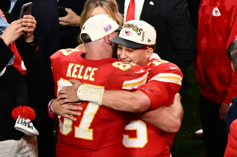 Kansas City Chiefs' tight end #87 Travis Kelce and Kansas City Chiefs' quarterback #15 Patrick Mahomes hug after winning Super Bowl LVIII against the San Francisco 49ers at Allegiant Stadium in Las Vegas, Nevada, February 11, 2024. (Photo by Patrick T. Fallon / AFP) (Photo by PATRICK T. FALLON/AFP via Getty Images)