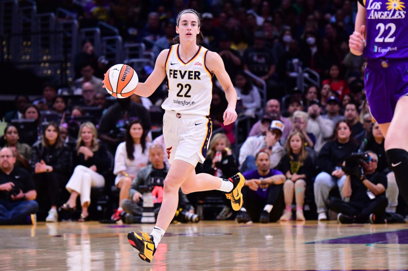 LOS ANGELES, CA - MAY 24: Caitlin Clark #22 of the Indiana Fever dribbles the ball during the game against the Los Angeles Sparks on May 24, 2024 at Crypto.com Arena in Los Angeles, California. NOTE TO USER: User expressly acknowledges and agrees that, by downloading and/or using this Photograph, user is consenting to the terms and conditions of the Getty Images License Agreement. Mandatory Copyright Notice: Copyright 2024 NBAE (Photo by Adam Pantozzi/NBAE via Getty Images)