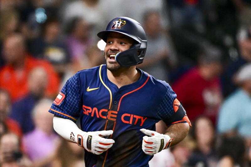 HOUSTON, TEXAS - MAY 20: Jose Altuve #27 of the Houston Astros celebrates after scoring a three-run home run in the second inning against the Los Angeles Angels at Minute Maid Park on May 20, 2024 in Houston, Texas. (Photo by Logan Riely/Getty Images)