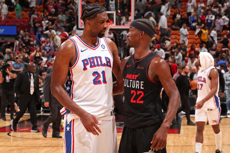 MIAMI, FL - APRIL 4: Joel Embiid #21 of the Philadelphia 76ers and Jimmy Butler #22 of the Miami Heat embrace after the game on April 4, 2024 at Kaseya Center in Miami, Florida. NOTE TO USER: User expressly acknowledges and agrees that, by downloading and or using this Photograph, user is consenting to the terms and conditions of the Getty Images License Agreement. Mandatory Copyright Notice: Copyright 2024 NBAE (Photo by Issac Baldizon/NBAE via Getty Images)