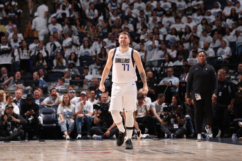 MINNEAPOLIS, MN - MAY 30: Luka Doncic #77 of the Dallas Mavericks smiles during the game against the Minnesota Timberwolves during Round 3 Game 5 of the 2024 NBA Playoffs on May 30, 2024 at Target Center in Minneapolis, Minnesota. NOTE TO USER: User expressly acknowledges and agrees that, by downloading and or using this Photograph, user is consenting to the terms and conditions of the Getty Images License Agreement. Mandatory Copyright Notice: Copyright 2024 NBAE (Photo by Joe Murphy/NBAE via Getty Images)