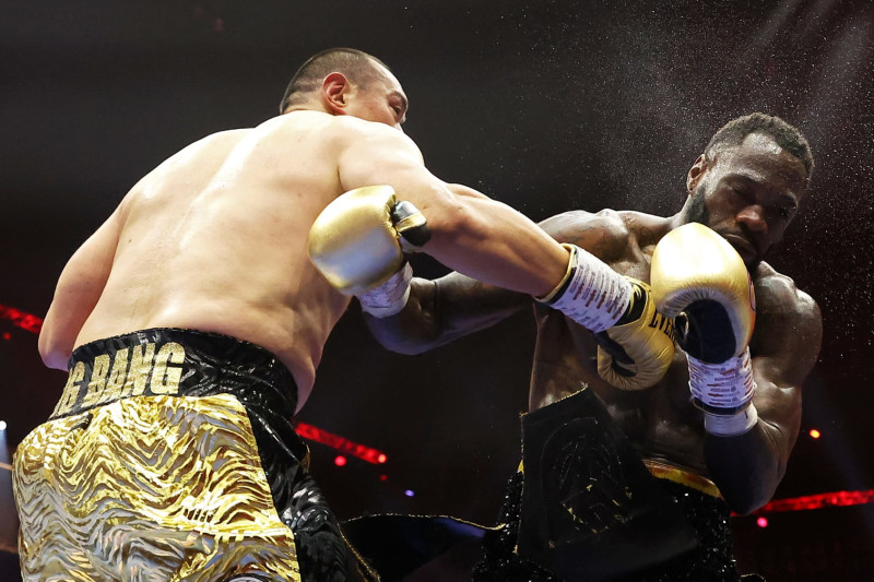 RIYADH, SAUDI ARABIA - JUNE 01: Deontay Wilder of Team Matchroom is knocked down by Zhilei Zhang of Team Queensberry during the Heavyweight fight between Deontay Wilder of Team Matchroom and Zhilei Zhang of Team Queensberry on the 5v5: Queensberry v Matchroom Fight Night card at Kingdom Arena on June 01, 2024 in Riyadh, Saudi Arabia. (Photo by Richard Pelham/Getty Images)