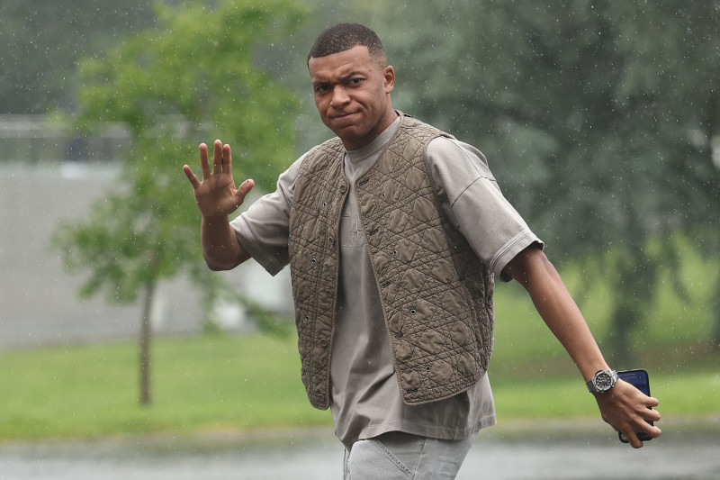 TOPSHOT - France's forward Kylian Mbappe arrives to the national team's training camp for the upcoming UEFA Euro 2024 European Football Championship, in Clairefontaine-en-Yvelines on May 29, 2024. (Photo by FRANCK FIFE / AFP) (Photo by FRANCK FIFE/AFP via Getty Images)