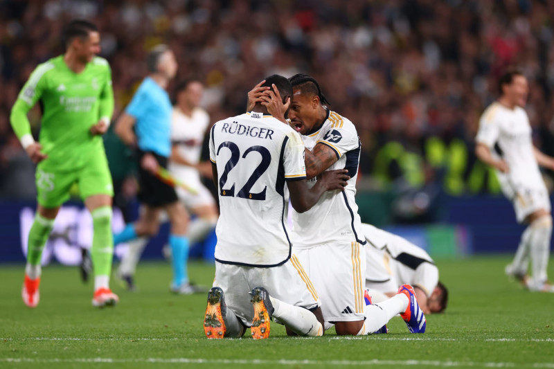 LONDON, ENGLAND - JUNE 01: Antonio Rudiger and Eder Militao of Real Madrid celebrate after the UEFA Champions League 2023/24 final match between Borussia Dortmund v Real Madrid CF at Wembley Stadium on June 01, 2024 in London, England. (Photo by Marc Atkins/Getty Images)