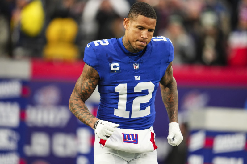 EAST RUTHERFORD, NJ - JANUARY 07: Darren Waller #12 of the New York Giants runs out of the tunnel prior to an NFL football game against the Philadelphia Eagles at MetLife Stadium on January 7, 2024 in East Rutherford, New Jersey. (Photo by Cooper Neill/Getty Images)