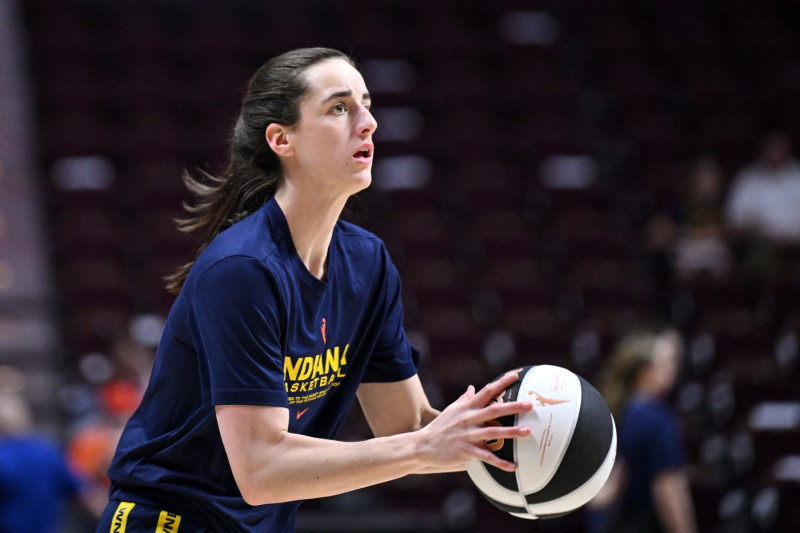 UNCASVILLE, CONNECTICUT - JUNE 10: Caitlin Clark #22 of the Indiana Fever takes a shot during warmups before a game against the Connecticut Sun at the Mohegan Sun Arena on June 10, 2024 in Uncasville, Connecticut. NOTE TO USER: User expressly acknowledges and agrees that, by downloading and or using this photograph, User is consenting to the terms and conditions of the Getty Images License Agreement. (Photo by Brian Fluharty/Getty Images)