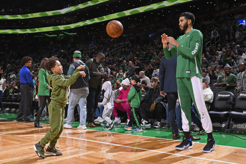 BOSTON, MA - DECEMBER 15: Jayson Tatum #0 of the Boston Celtics and son Deuce Tatum look on before the game against the Orlando Magic on December 15, 2023 at the TD Garden in Boston, Massachusetts. NOTE TO USER: User expressly acknowledges and agrees that, by downloading and or using this photograph, User is consenting to the terms and conditions of the Getty Images License Agreement. Mandatory Copyright Notice: Copyright 2023 NBAE  (Photo by Brian Babineau/NBAE via Getty Images)