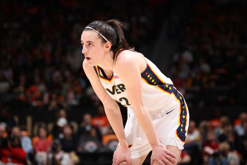 WASHINGTON, D.C. - JUNE 7: Caitlin Clark #22 of the Indiana Fever looks on during the game against the Washington Mystics during a 2024 Commissioner's Cup game on June 7, 2024 at Entertainment and Sports Arena in Washington, D.C. NOTE TO USER: User expressly acknowledges and agrees that, by downloading and or using this photograph, User is consenting to the terms and conditions of the Getty Images License Agreement. Mandatory Copyright Notice: Copyright 2024 NBAE (Photo by Stephen Gosling/NBAE via Getty Images)