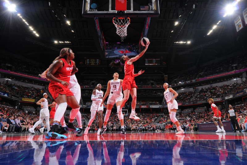 INDIANAPOLIS, IN - JUNE 13: Caitlin Clark #22 of the Indiana Fever shoots the ball during the game against the Atlanta Dream on June 13, 2024 at Gainbridge Fieldhouse in Indianapolis, Indiana. NOTE TO USER: User expressly acknowledges and agrees that, by downloading and or using this Photograph, user is consenting to the terms and conditions of the Getty Images License Agreement. Mandatory Copyright Notice: Copyright 2024 NBAE (Photo by Ron Hoskins/NBAE via Getty Images)