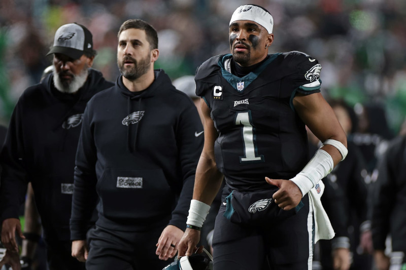 PHILADELPHIA, PENNSYLVANIA - DECEMBER 25: Philadelphia Eagles head coach Nick Sirianni and Jalen Hurts #1 of the Philadelphia Eagles run off the field against the New York Giants at Lincoln Financial Field on December 25, 2023 in Philadelphia, Pennsylvania. (Photo by Adam Hunger/Getty Images)