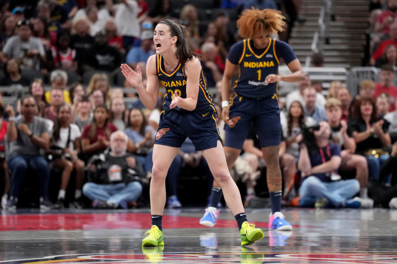 INDIANAPOLIS, INDIANA - JUNE 16: Caitlin Clark #22 of the Indiana Fever celebrates a basket during the first half against the Chicago Sky at Gainbridge Fieldhouse on June 16, 2024 in Indianapolis, Indiana. NOTE TO USER: User expressly acknowledges and agrees that, by downloading and or using this photograph, User is consenting to the terms and conditions of the Getty Images License Agreement. (Photo by Emilee Chinn/Getty Images)