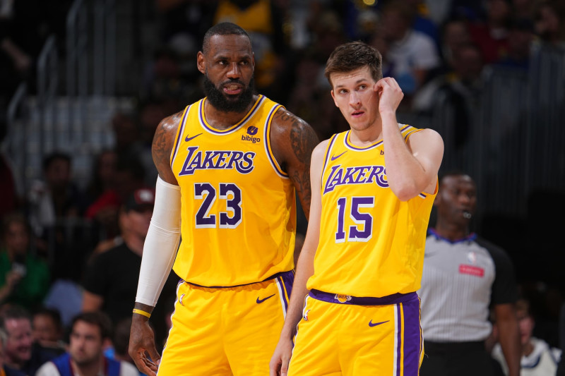 DENVER, CO - APRIL 29: LeBron James #23 of the Los Angeles Lakers and Austin Reaves #15 of the Los Angeles Lakers look on during the game against the Denver Nuggets during Round One Game Five of the 2024 NBA Playoffs on April 29, 2024 at the Ball Arena in Denver, Colorado. NOTE TO USER: User expressly acknowledges and agrees that, by downloading and/or using this Photograph, user is consenting to the terms and conditions of the Getty Images License Agreement. Mandatory Copyright Notice: Copyright 2024 NBAE (Photo by Bart Young/NBAE via Getty Images)