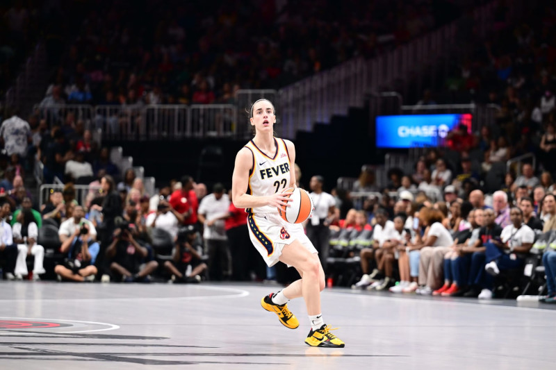 ATLANTA, GA - JUNE 21: Caitlin Clark #22 of the Indiana Fever handles the ball during the game against the Atlanta Dream on June 21, 2024 at Gateway Center Arena in College Park, Georgia. NOTE TO USER: User expressly acknowledges and agrees that, by downloading and or using this photograph, User is consenting to the terms and conditions of the Getty Images License Agreement. Mandatory Copyright Notice: Copyright 2024 NBAE (Photo by Adam Hagy/NBAE via Getty Images)