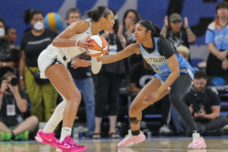 CHICAGO, IL - JUNE 27: forward Angel Reese #5 of the Chicago Sky guards A'ja Wilson #22 of the Las Vegas Aces during the first half on June 27,2024 at Wintrust Arena in Chicago, Illinois. (Photo by Melissa Tamez/Icon Sportswire via Getty Images)