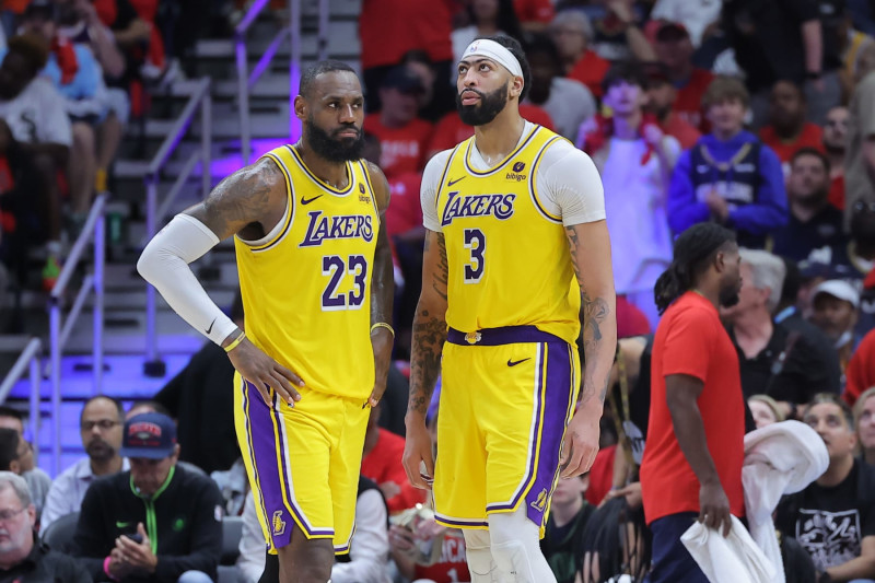 NEW ORLEANS, LOUISIANA - APRIL 16: LeBron James #23 and Anthony Davis #3 of the Los Angeles Lakers reacts against the New Orleans Pelicans during a play-in tournament game at the Smoothie King Center on April 16, 2024 in New Orleans, Louisiana. NOTE TO USER: User expressly acknowledges and agrees that, by downloading and or using this Photograph, user is consenting to the terms and conditions of the Getty Images License Agreement. (Photo by Jonathan Bachman/Getty Images)