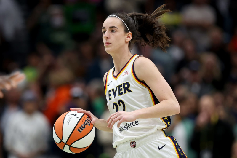 SEATTLE, WASHINGTON - JUNE 27: Caitlin Clark #22 of the Indiana Fever dribbles against the Seattle Storm during the first quarter at Climate Pledge Arena on June 27, 2024 in Seattle, Washington. NOTE TO USER: User expressly acknowledges and agrees that, by downloading and or using this photograph, User is consenting to the terms and conditions of the Getty Images License Agreement. (Photo by Steph Chambers/Getty Images)