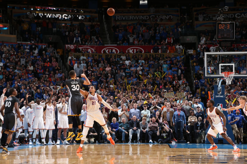 OKLAHOMA CITY, OK - FEBRUARY 27:  Stephen Curry #30 of the Golden State Warriors hits the winning shot against Andre Roberson #21 of the Oklahoma City Thunder on February 27, 2016 at Chesapeake Energy Arena in Oklahoma City, Oklahoma. NOTE TO USER: User expressly acknowledges and agrees that, by downloading and or using this photograph, User is consenting to the terms and conditions of the Getty Images License Agreement. Mandatory Copyright Notice: Copyright 2016 NBAE (Photo by Joe Murphy/NBAE via Getty Images)