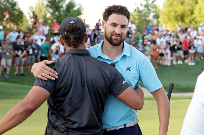 LAS VEGAS, NEVADA - JUNE 29: Patrick Mahomes (L) and Klay Thompson meet during Capital One's The Match VIII - Curry & Thompson vs. Mahomes & Kelce at Wynn Golf Club on June 29, 2023 in Las Vegas, Nevada. (Photo by Ezra Shaw/Getty Images for The Match)