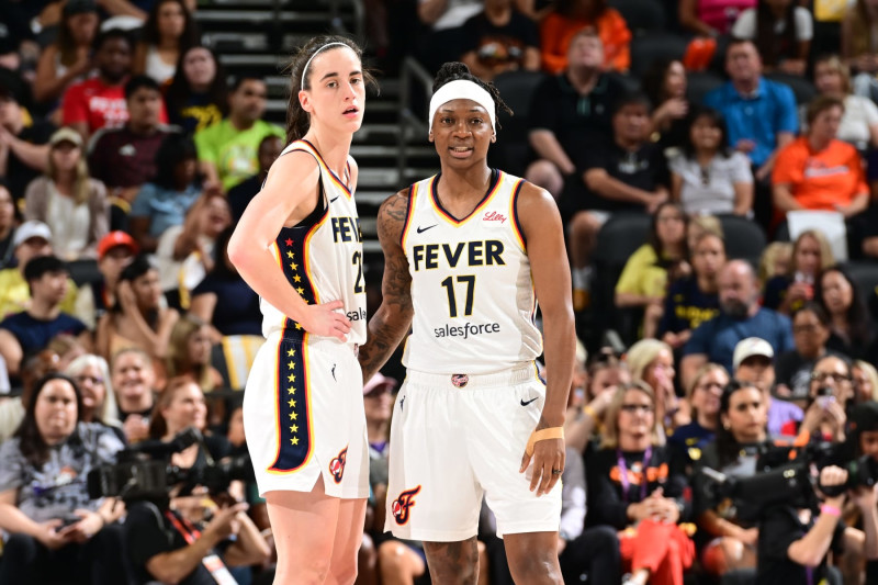 PHOENIX, AZ - JUNE 30: Caitlin Clark #22 and Erica Wheeler #17 of the Indiana Fever talk during the game against the Phoenix Mercury on June 30, 2024 at Footprint Center in Phoenix, Arizona. NOTE TO USER: User expressly acknowledges and agrees that, by downloading and or using this photograph, user is consenting to the terms and conditions of the Getty Images License Agreement. Mandatory Copyright Notice: Copyright 2024 NBAE (Photo by Kate Frese/NBAE via Getty Images)