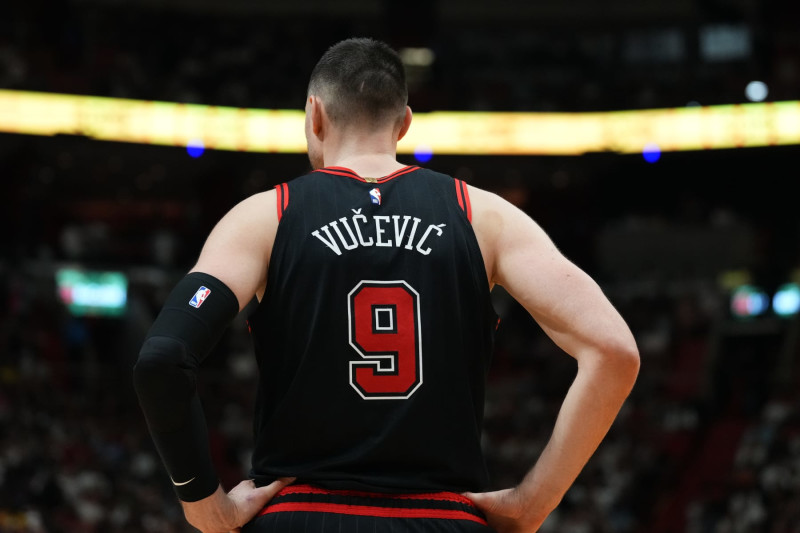 MIAMI, FLORIDA - APRIL 19: Nikola Vucevic #9 of the Chicago Bulls looks on against the Miami Heat in the fourth quarter during the Play-In Tournament at Kaseya Center on April 19, 2024 in Miami, Florida. NOTE TO USER: User expressly acknowledges and agrees that, by downloading and or using this photograph, User is consenting to the terms and conditions of the Getty Images License Agreement. (Photo by Rich Storry/Getty Images)