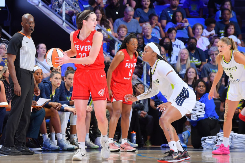 ARLINGTON, TX - JULY 17: Odyssey Sims #2 of the Dallas Wings plays defense during the game  against Caitlin Clark #22 of the Indiana Fever on July 17, 2024 at the College Park Center in Arlington, TX. NOTE TO USER: User expressly acknowledges and agrees that, by downloading and or using this photograph, User is consenting to the terms and conditions of the Getty Images License Agreement. Mandatory Copyright Notice: Copyright 2024 NBAE (Photo by Michael Gonzales/NBAE via Getty Images)