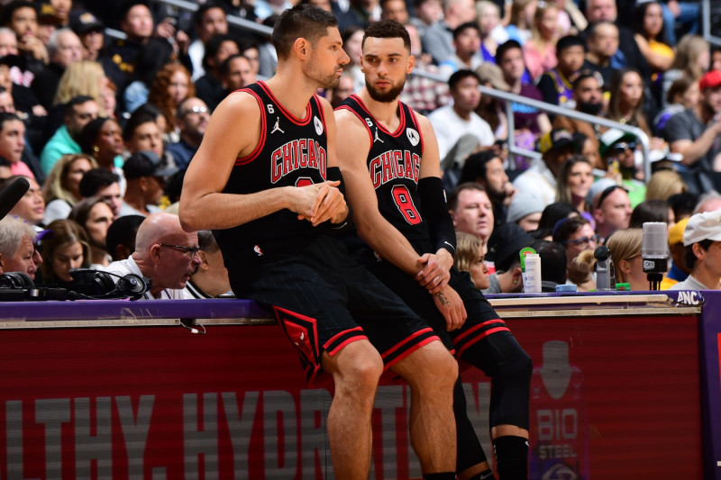 LOS ANGELES, CA - MARCH 26: Nikola Vucevic #9 and Zach LaVine #8 of the Chicago Bulls look on during the game against the Los Angeles Lakers on March 26, 2023 at Crypto.Com Arena in Los Angeles, California. NOTE TO USER: User expressly acknowledges and agrees that, by downloading and/or using this Photograph, user is consenting to the terms and conditions of the Getty Images License Agreement. Mandatory Copyright Notice: Copyright 2023 NBAE (Photo by Adam Pantozzi/NBAE via Getty Images)