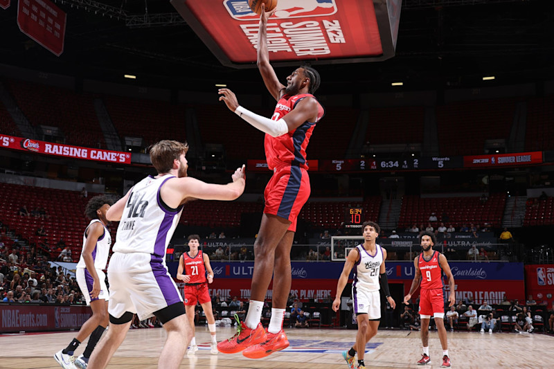 LAS VEGAS, NV - JULY 18:  Alex Sarr #12 of the Washington Wizards goes to the basket during the game on July 18, 2024 at the Thomas & Mack Center in Las Vegas, Nevada. NOTE TO USER: User expressly acknowledges and agrees that, by downloading and or using this photograph, User is consenting to the terms and conditions of the Getty Images License Agreement. Mandatory Copyright Notice: Copyright 2024 NBAE (Photo by Stephen Gosling/NBAE via Getty Images)