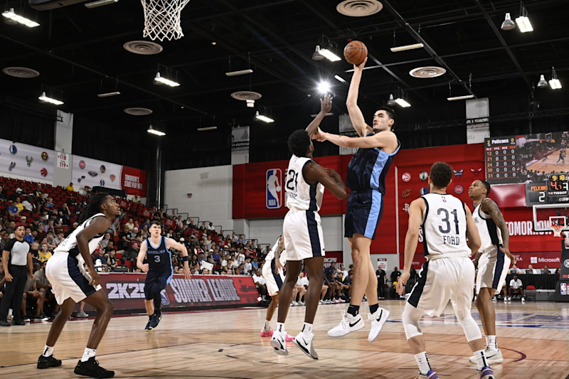 LAS VEGAS, NV - JULY 18: Zach Edey #14 of the Memphis Grizzlies shoots the ball during the game against the New Orleans Pelicans on July 18, 2024 at the Cox Pavilion in Las Vegas, Nevada. NOTE TO USER: User expressly acknowledges and agrees that, by downloading and or using this photograph, User is consenting to the terms and conditions of the Getty Images License Agreement. Mandatory Copyright Notice: Copyright 2024 NBAE (Photo by David Dow/NBAE via Getty Images)