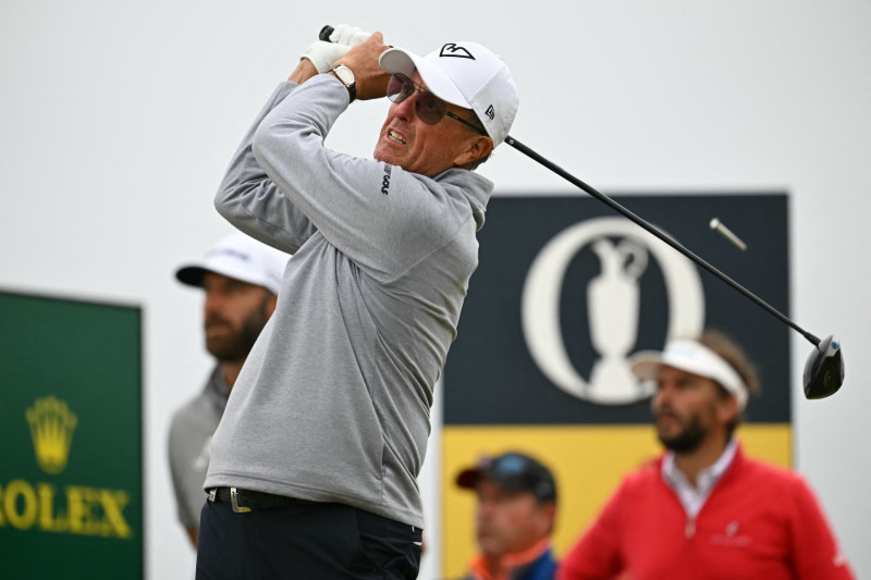 US golfer Phil Mickelson watches his drive from the 4th tee on day two of the 152nd British Open Golf Championship at Royal Troon on the south west coast of Scotland on July 19, 2024. (Photo by Paul ELLIS / AFP) / RESTRICTED TO EDITORIAL USE (Photo by PAUL ELLIS/AFP via Getty Images)