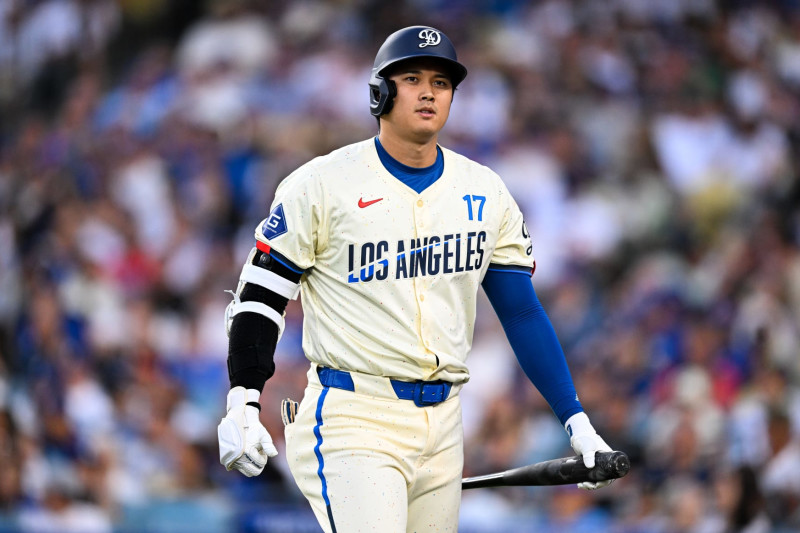 LOS ANGELES, CALIFORNIA - AUGUST 10: Shohei Ohtani #17 of Los Angeles Dodgers strikes out in the bottom of the fifth inning during the regular season game against the Pittsburgh Pirates / Los Angeles Dodgers at Dodger Stadium on August 10, 2024 in Los Angeles, California. (Photo by Gene Wang/Getty Images)