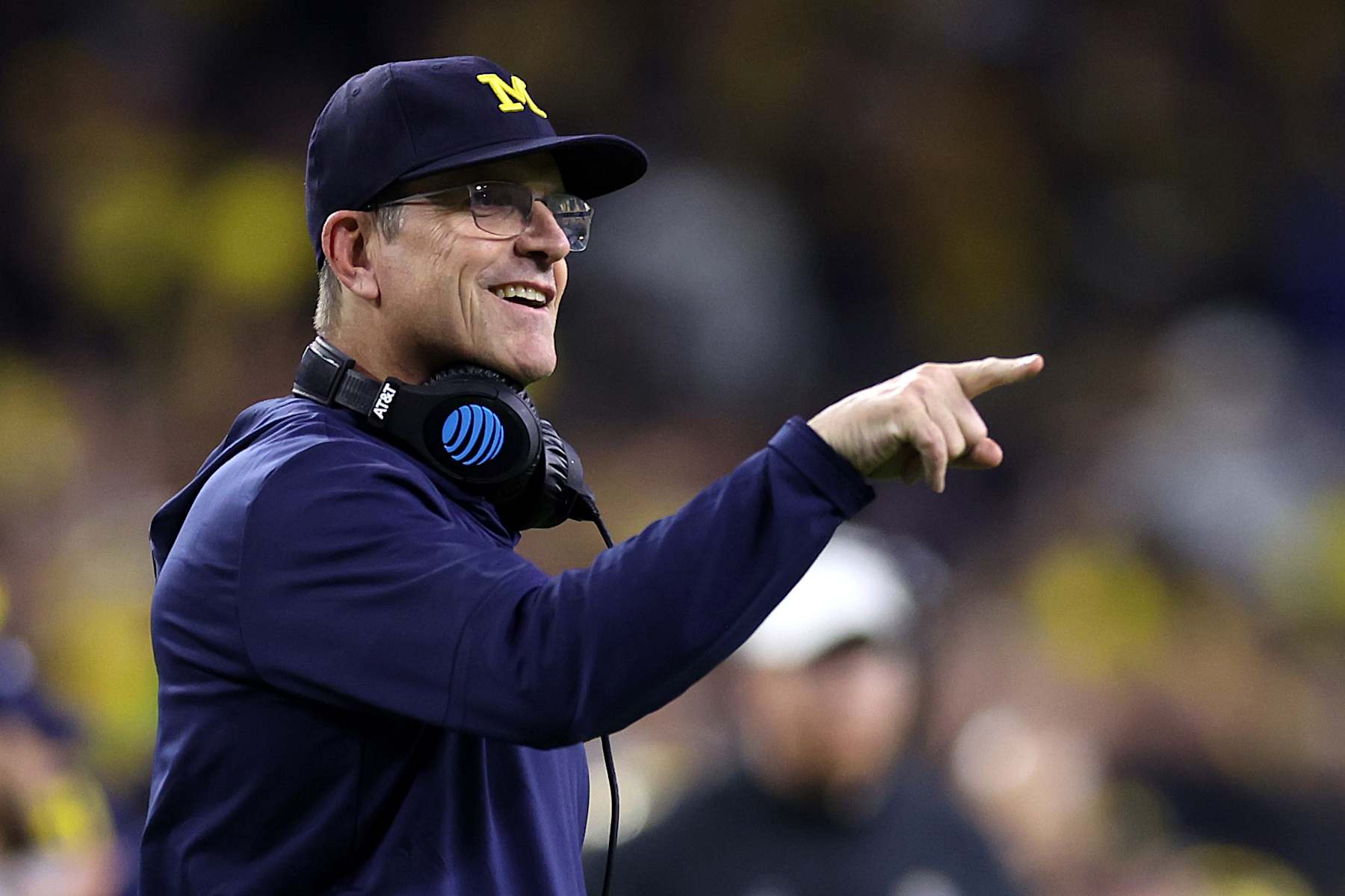 HOUSTON, TEXAS - JANUARY 08:  Head coach Jim Harbaugh of the Michigan Wolverines looks on in the first half against the Washington Huskies during the 2024 CFP National Championship game at NRG Stadium on January 08, 2024 in Houston, Texas. (Photo by Maddie Meyer/Getty Images)