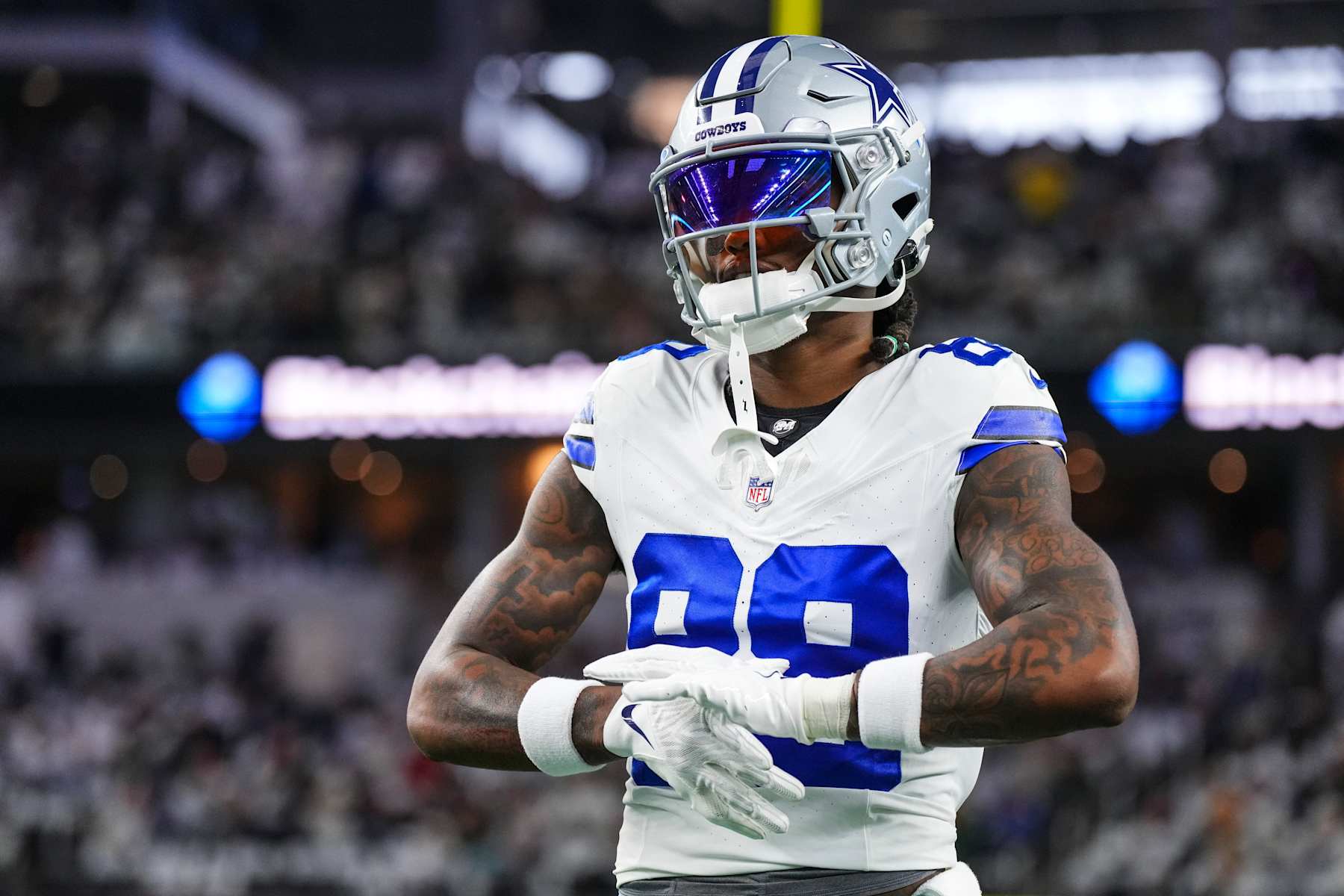 DALLAS, TX - JANUARY 14: CeeDee Lamb #88 of the Dallas Cowboys warms up prior to an NFL wild-card playoff football game against the Green Bay Packers at AT&T Stadium on January 14, 2024 in Dallas, Texas. (Photo by Cooper Neill/Getty Images)