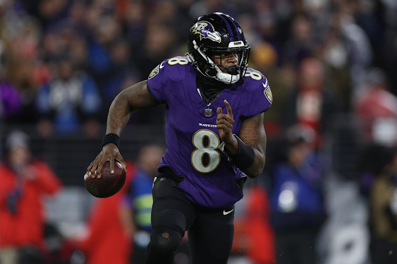 BALTIMORE, MARYLAND - JANUARY 28: Lamar Jackson #8 of the Baltimore Ravens rushes with the ball against the Kansas City Chiefs in the AFC Championship Game at M&T Bank Stadium on January 28, 2024 in Baltimore, Maryland. (Photo by Patrick Smith/Getty Images)