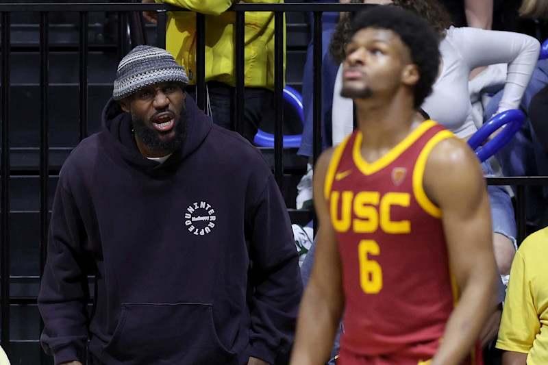 BERKELEY, CALIFORNIA - FEBRUARY 07: LeBron James #23 of the Los Angeles Lakers shouts to his son, Bronny James #6 of the USC Trojans, during Bronny's game against the California Golden Bears at Haas Pavilion on February 07, 2024 in Berkeley, California. (Photo by Ezra Shaw/Getty Images)