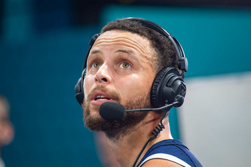 PARIS, FRANCE - AUGUST 10: Stephen Curry #4 of United States gives an interview after the Men's Gold Medal game between Team France and Team United States on day fifteen of the Olympic Games Paris 2024 at Stade Bercy Arena on August 10, 2024 in Paris, France. (Photo by RvS.Media/Monika Majer/Getty Images)