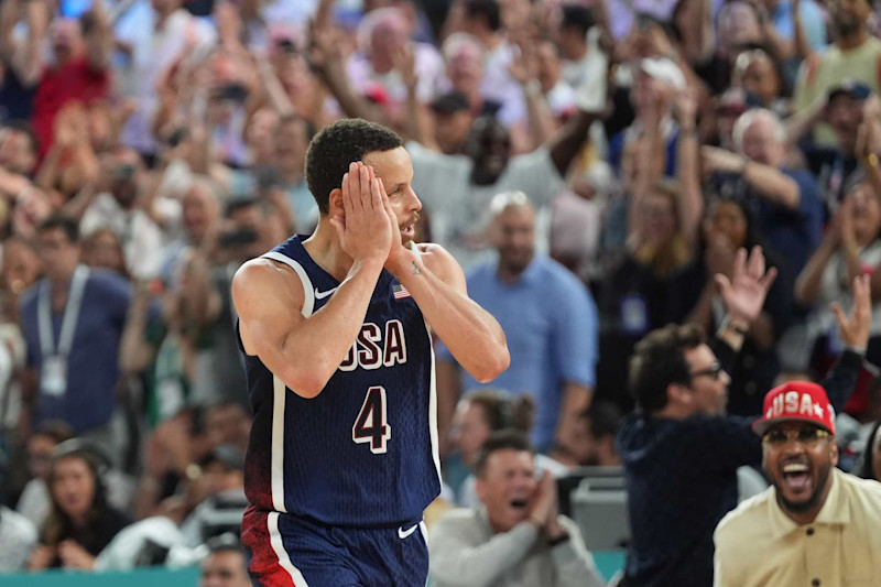 Paris, France - August 10 : United States shooting guard Stephen Curry (4) reacts after making a basket during a men's basketball final held at Bercy Arena at the 2024 Summer Olympics, in Paris, France, on Saturday, Aug 10, 2024. (Photo by Jabin Botsford/The Washington Post via Getty Images)