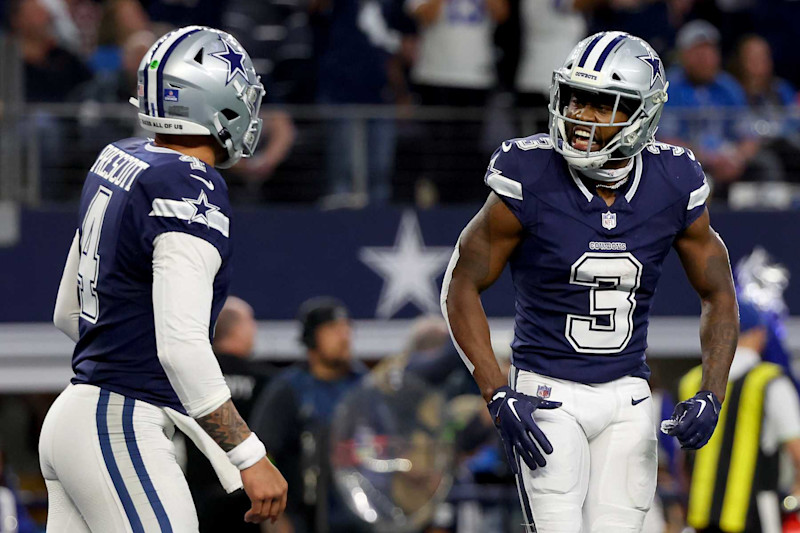 ARLINGTON, TEXAS - DECEMBER 30: Brandin Cooks #3 of the Dallas Cowboys celebrates with Dak Prescott #4 after scoring a touchdown against the Detroit Lions during the fourth quarter in the game at AT&T Stadium on December 30, 2023 in Arlington, Texas. (Photo by Richard Rodriguez/Getty Images)