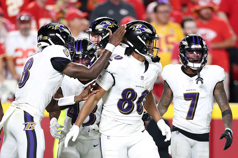 KANSAS CITY, MISSOURI - SEPTEMBER 05: Isaiah Likely #80 of the Baltimore Ravens celebrates his 49-yard touchdown with quarterback Lamar Jackson #8 of the Baltimore Ravens as they play against the Kansas City Chiefs during the fourth quarter at GEHA Field at Arrowhead Stadium on September 05, 2024 in Kansas City, Missouri. (Photo by Christian Petersen/Getty Images)