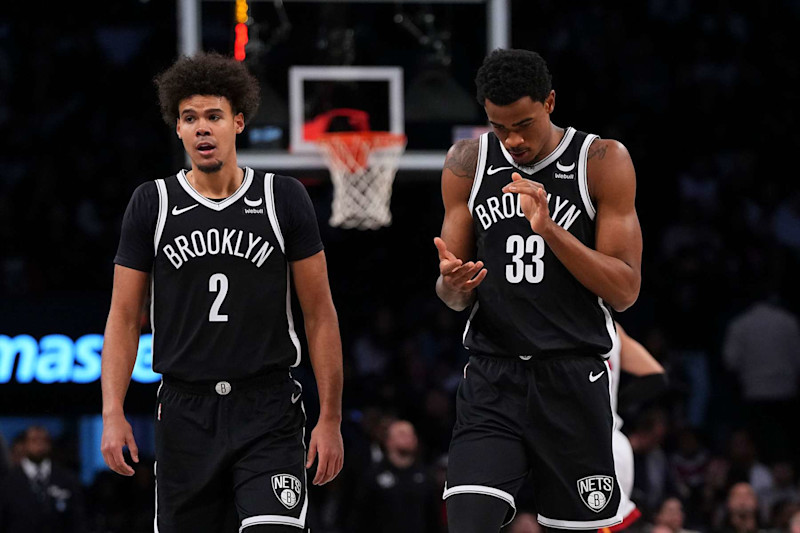 NEW YORK, NEW YORK - NOVEMBER 25: Cameron Johnson #2 and Nic Claxton #33 of the Brooklyn Nets look on Miami Heat at Barclays Center on November 25, 2023 in the Brooklyn borough of New York City. The Nets defeated the Heat 112-97. NOTE TO USER: User expressly acknowledges and agrees that, by downloading and or using this photograph, User is consenting to the terms and conditions of the Getty Images License Agreement. (Photo by Mitchell Leff/Getty Images)