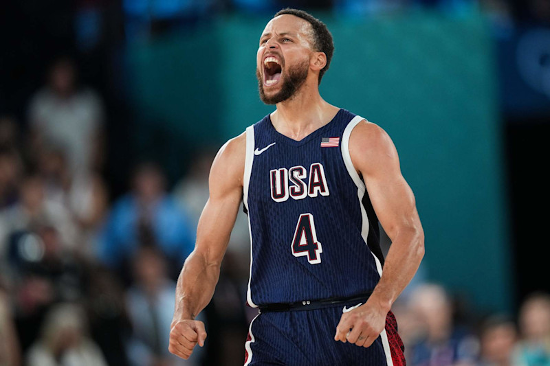 PARIS, FRANCE - AUGUST 10: Stephen Curry (4) of Team USA reacts during Men's Gold Medal game between Team France and Team United States on day fifteen of the Olympic Games Paris 2024 at Bercy Arena on August 10, 2024 in Paris, France. (Photo by Mustafa Ciftci/Anadolu via Getty Images)