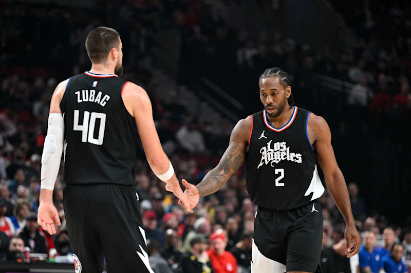 PORTLAND, OREGON - MARCH 22: Kawhi Leonard #2 of the LA Clippers and Ivica Zubac #40 shake hands during the first quarter of the game against the Portland Trail Blazers at the Moda Center on March 22, 2024 in Portland, Oregon. NOTE TO USER: User expressly acknowledges and agrees that, by downloading and or using this photograph, User is consenting to the terms and conditions of the Getty Images License Agreement. (Photo by Alika Jenner/Getty Images)